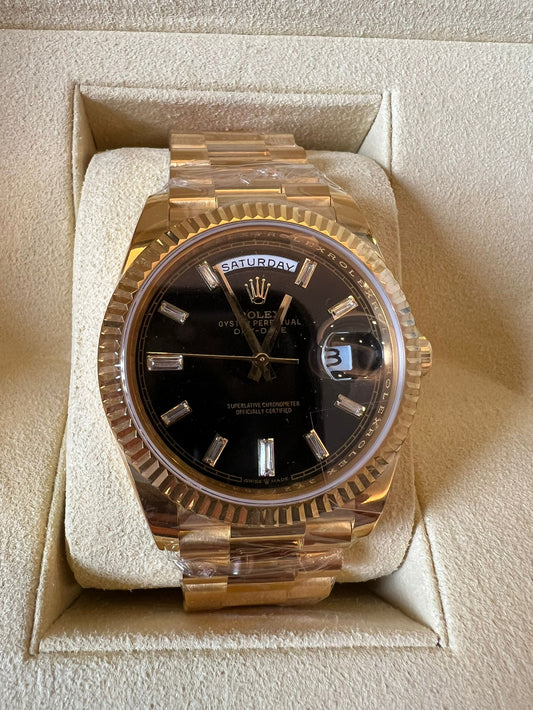 Rolex Day-Date 40 black dial 18K yellow gold watch
