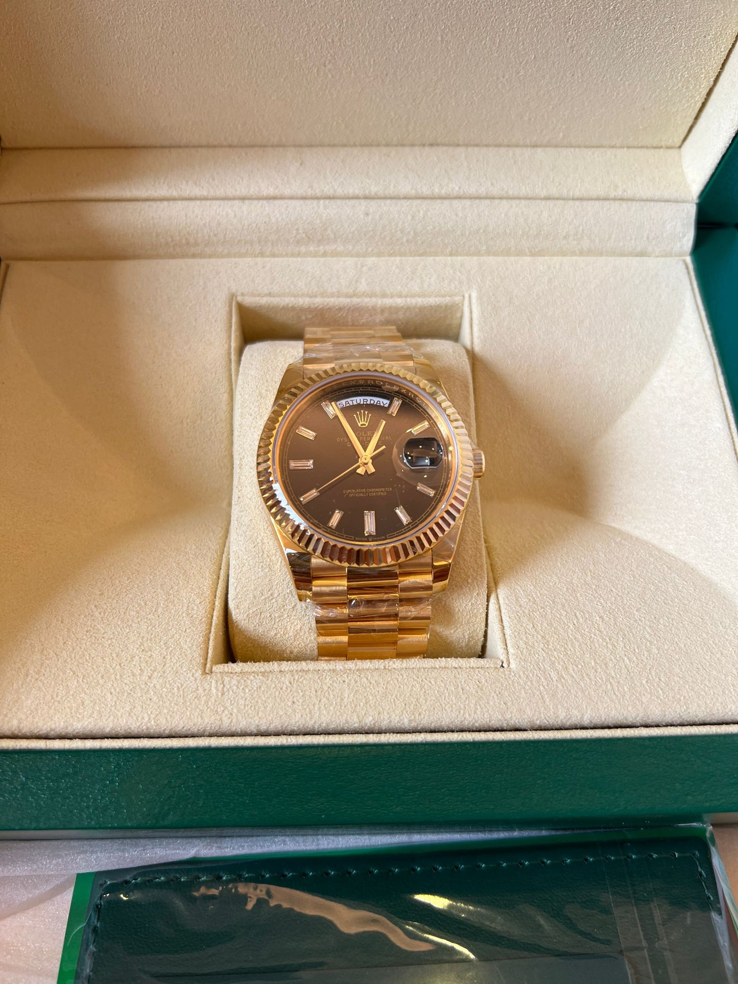 Rolex Day-Date 40 black dial 18K yellow gold watch