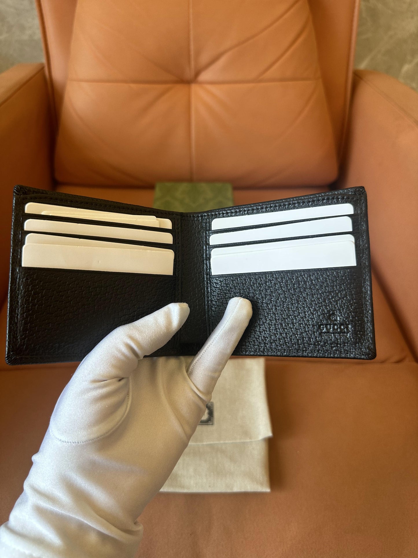 Cartera plegable Gucci de piel con diseño de bocado de caballo (negra)