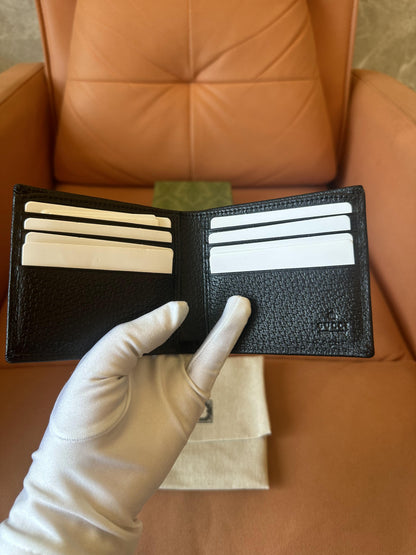Cartera plegable Gucci de piel con diseño de bocado de caballo (negra)