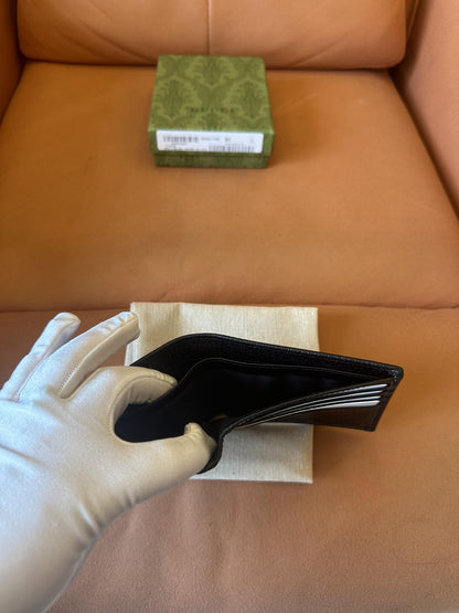 Cartera plegable Gucci de piel con diseño de bocado de caballo (negra)