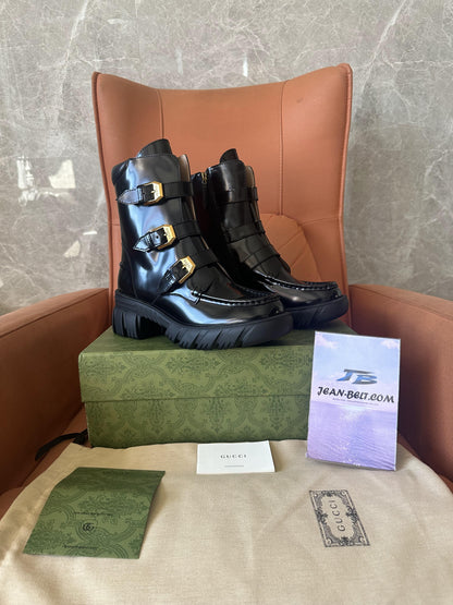 Botas de combate de couro envernizado da Gucci