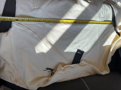 Conjunto de chándal Rhude color crema con bordado característico