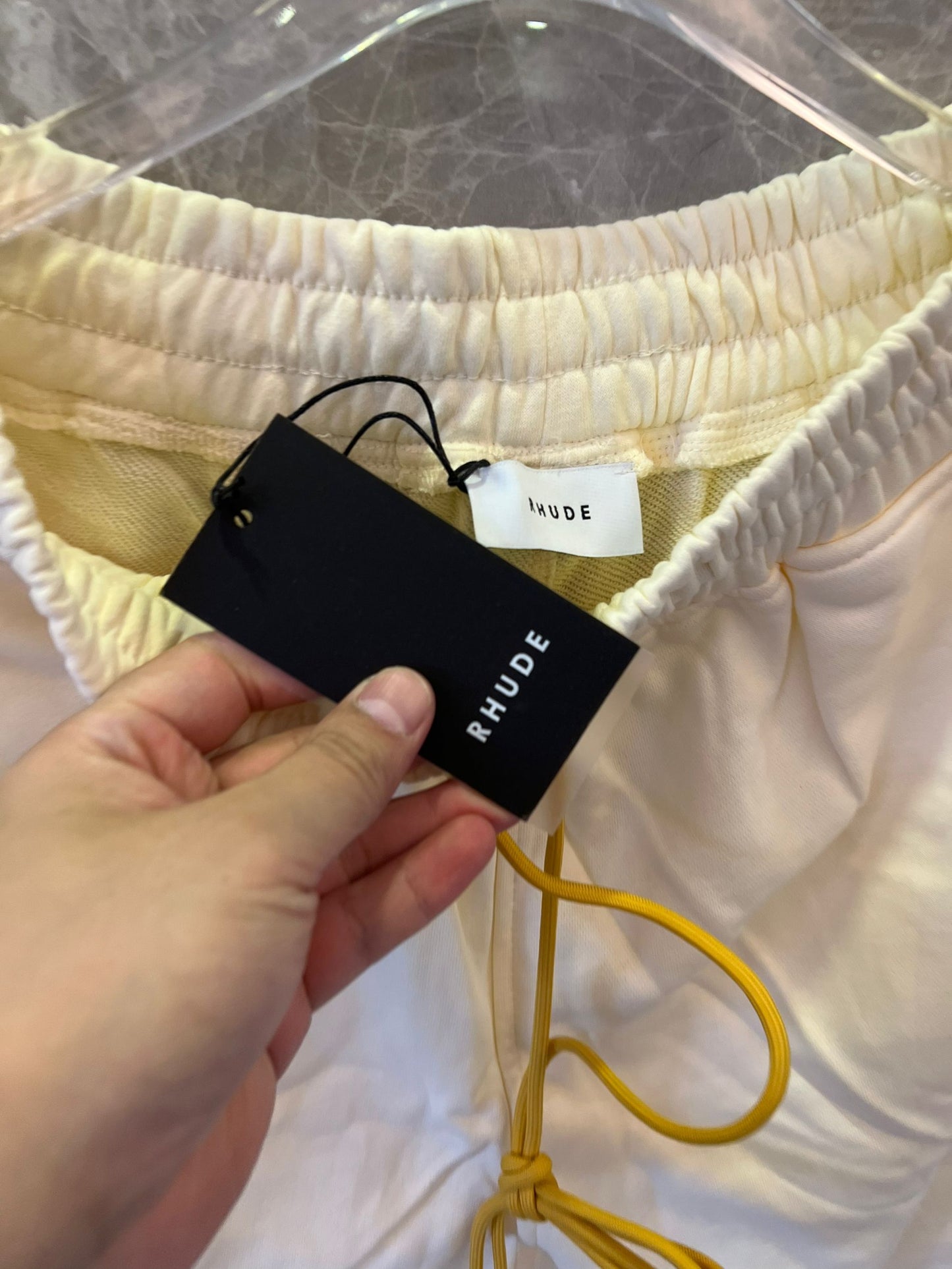 Shorts brancos com cordão e logotipo Rhude x McLaren
