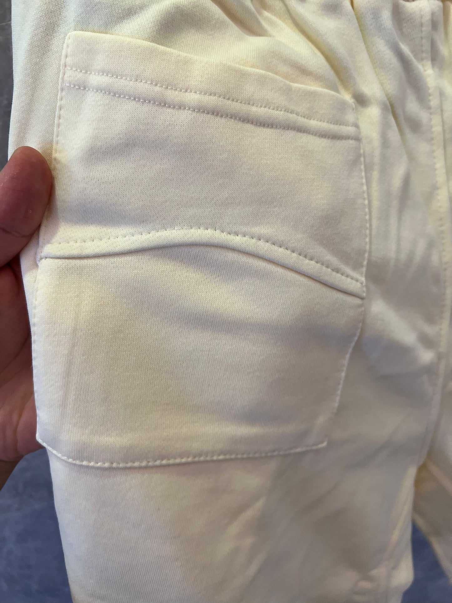 Shorts brancos com cordão e logotipo Rhude x McLaren