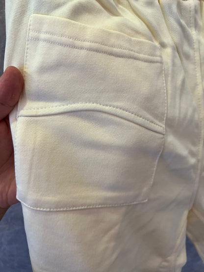 Shorts brancos com cordão e logotipo Rhude x McLaren
