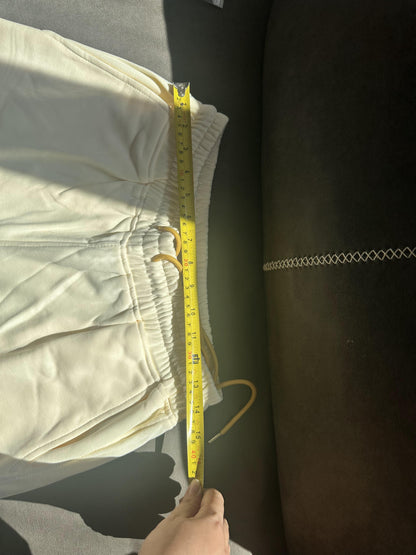 Shorts brancos com cordão e logotipo Rhude x McLaren