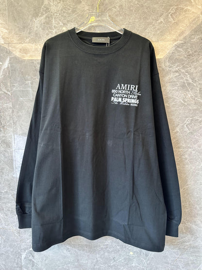 Amiri Palm Springs Long Sleeve Tee with Pink Cross Design