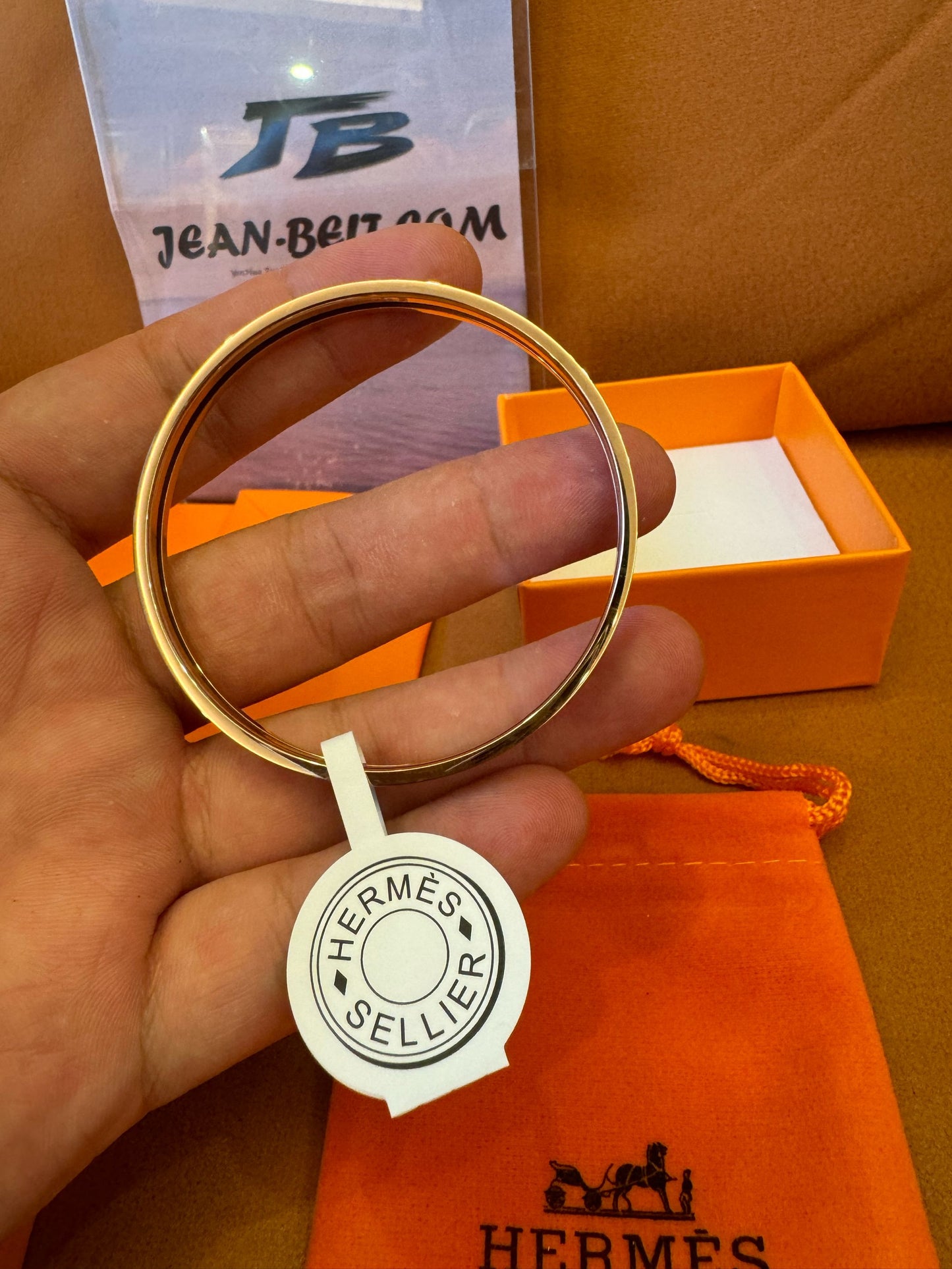 Brazalete de esmalte Hermes Sellier con detalles dorados