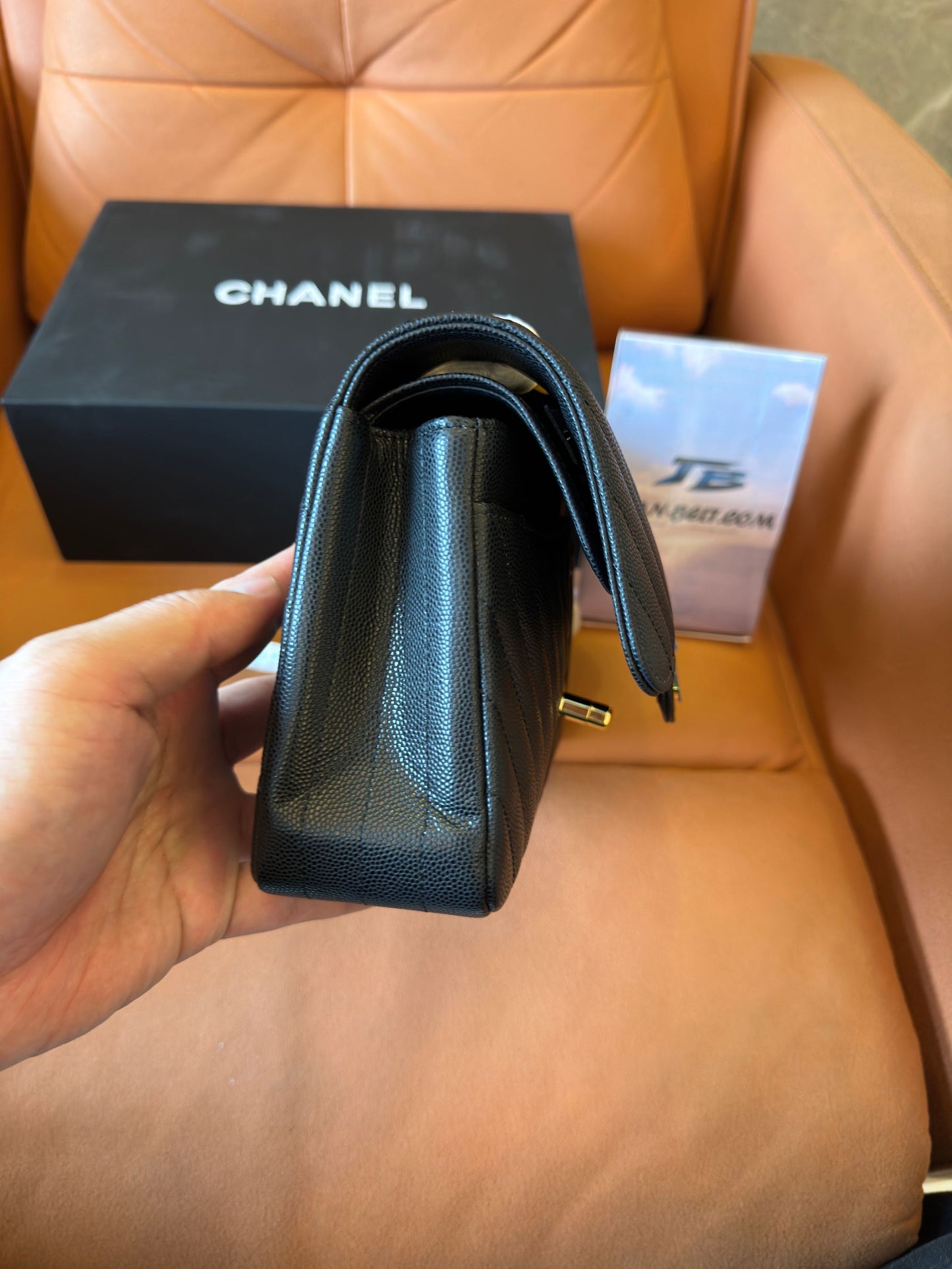 Chanel Classic Small Black Chevron Caviar Flap Bag
