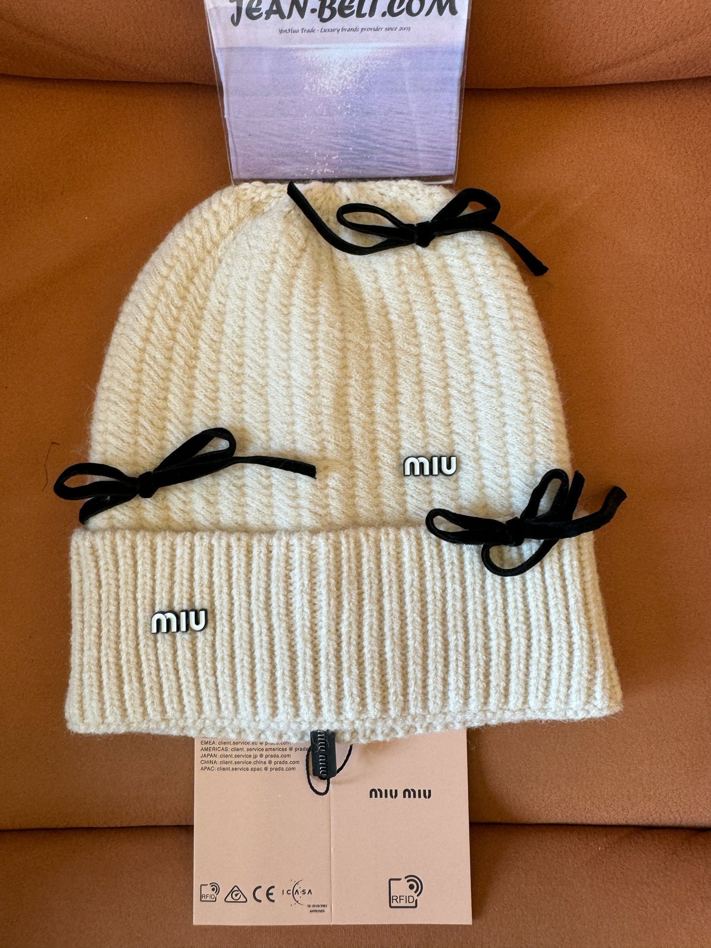 Gorro de punto de lana Miu Miu con detalles de lazo
