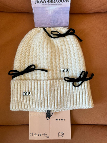 Gorro de punto de lana Miu Miu con detalles de lazo