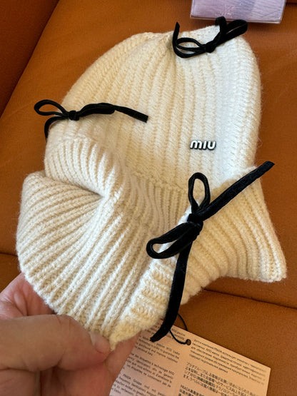 Gorro de punto de lana Miu Miu con detalles de lazo