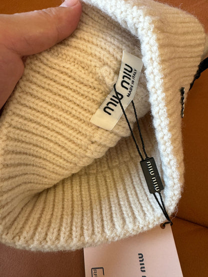 Gorro de punto de lana Miu Miu con detalles de lazo
