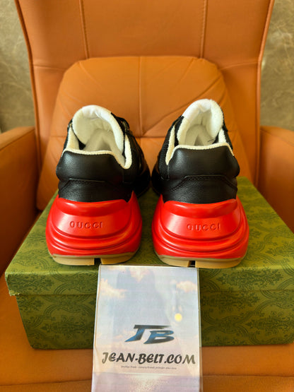 Zapatillas deportivas Gucci Rhyton con logotipo reflectante en negro, rojo y verde