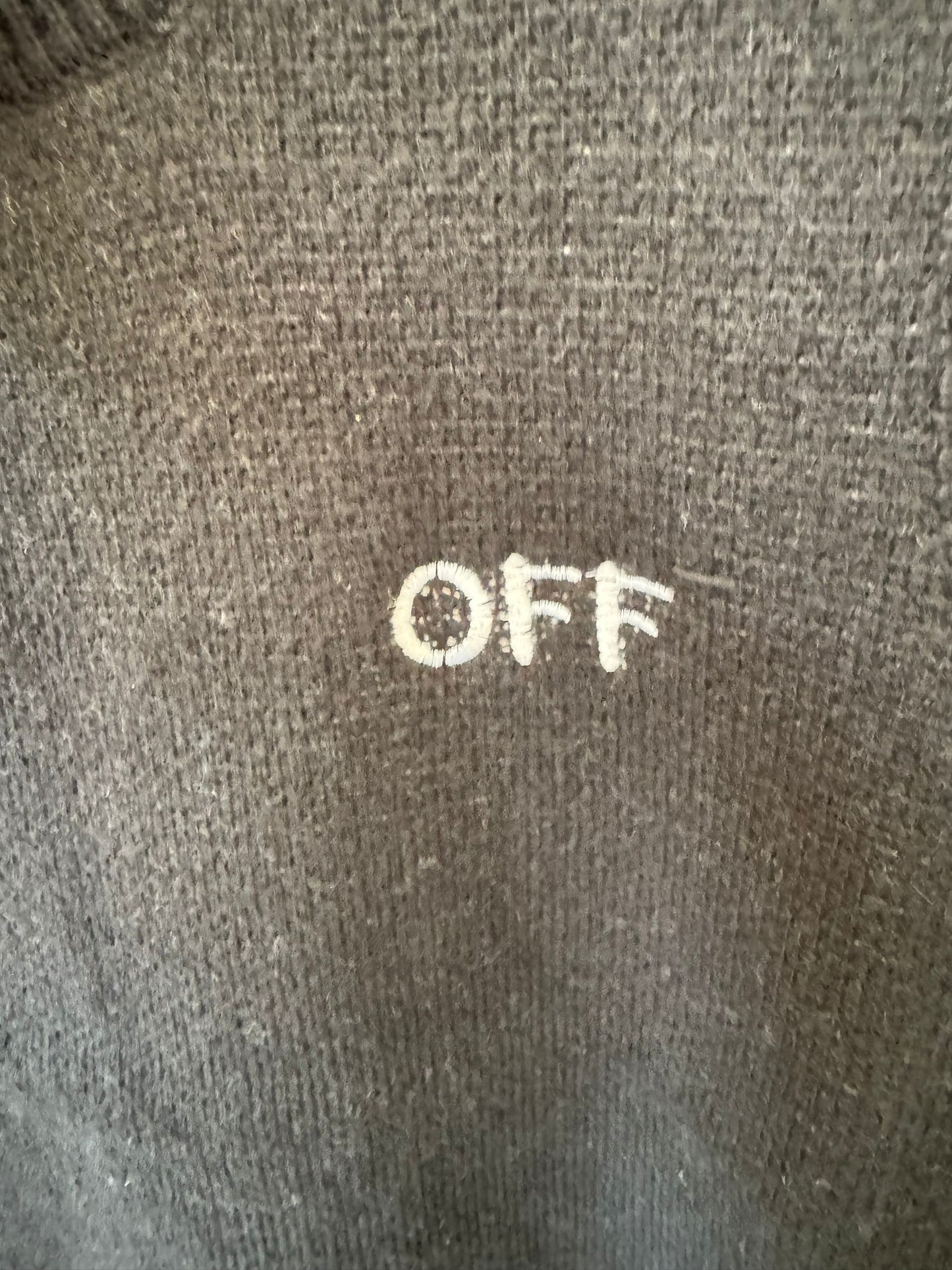 Off-White black knit vest with iconic arrows design