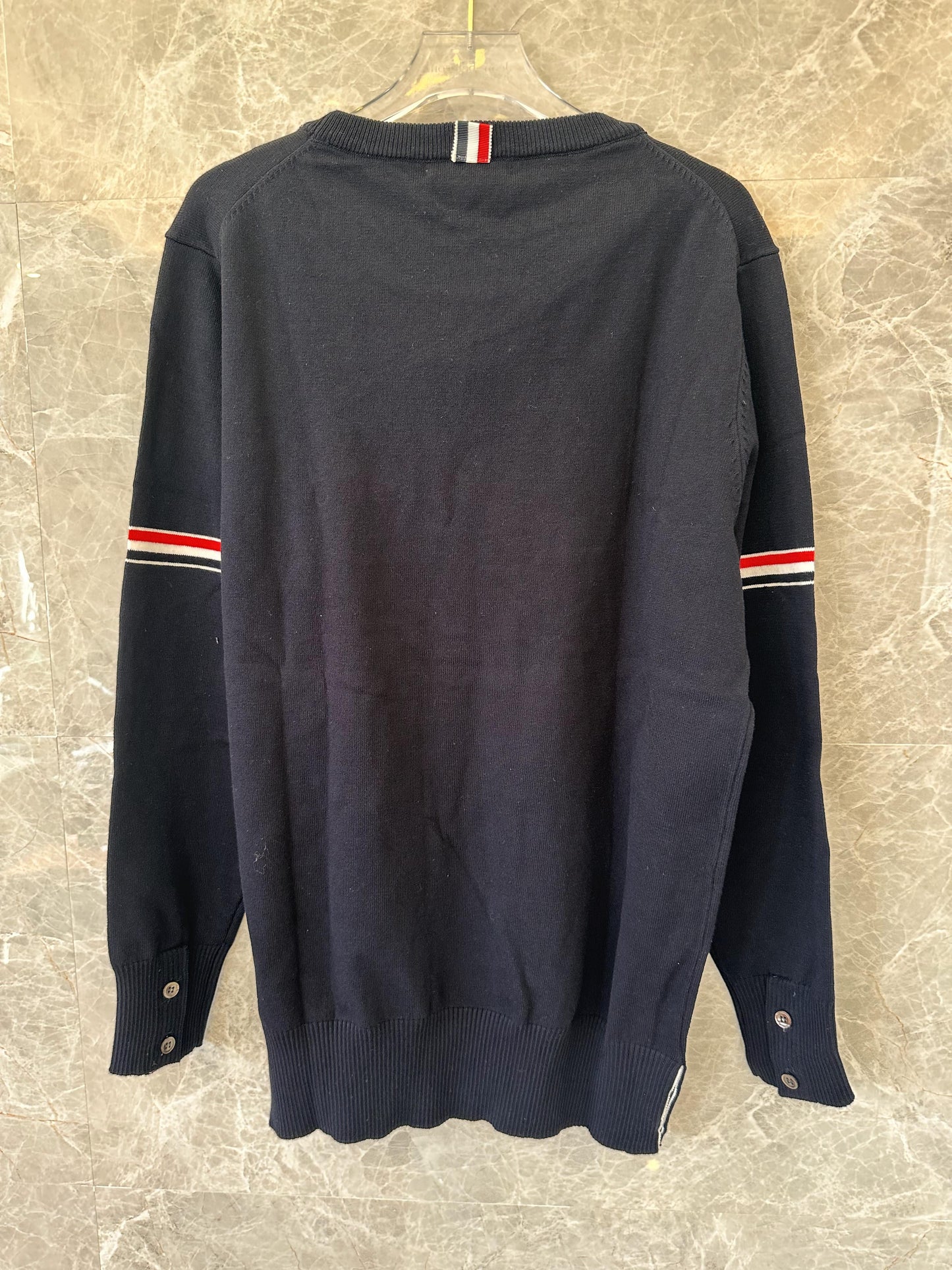 Thom Browne classic navy sweater with signature stripe detail
