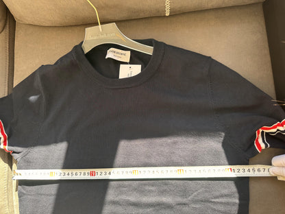 Thom Browne classic navy sweater with signature stripe detail