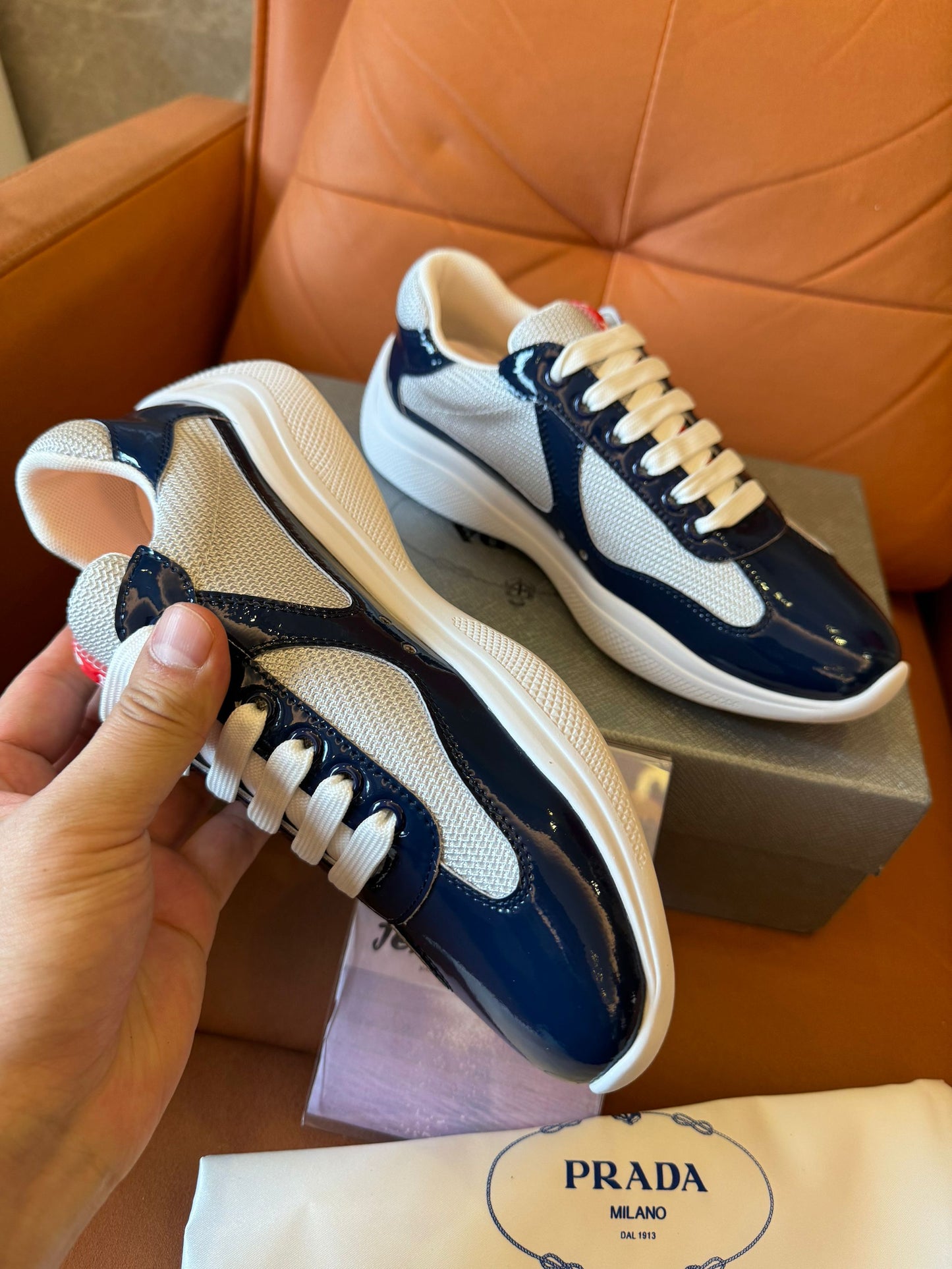 Prada men's navy and beige lace-up sneakers