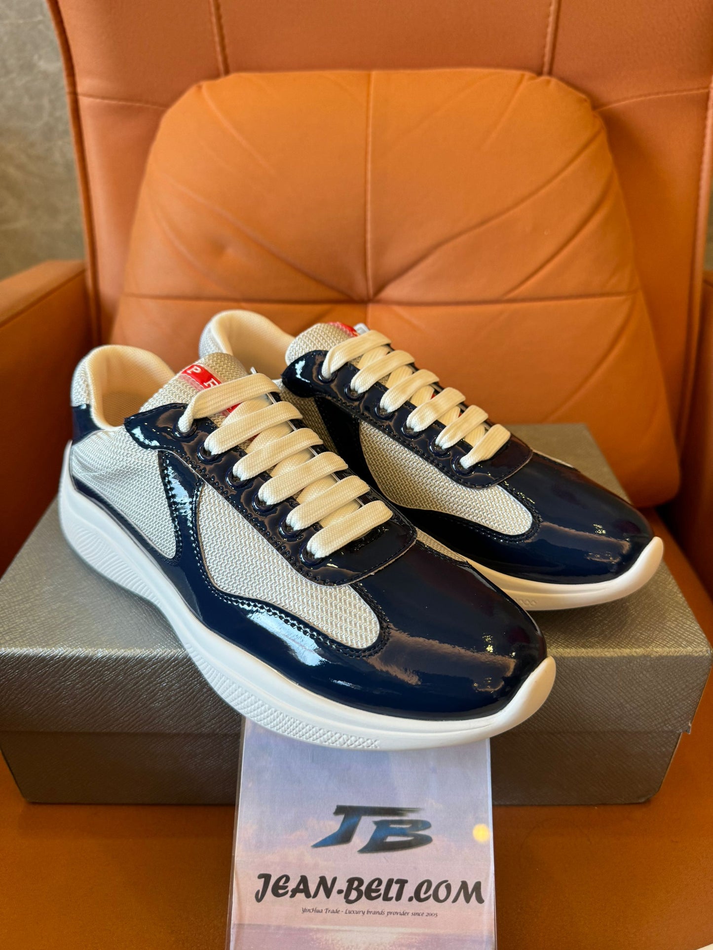 Prada men's navy and beige lace-up sneakers