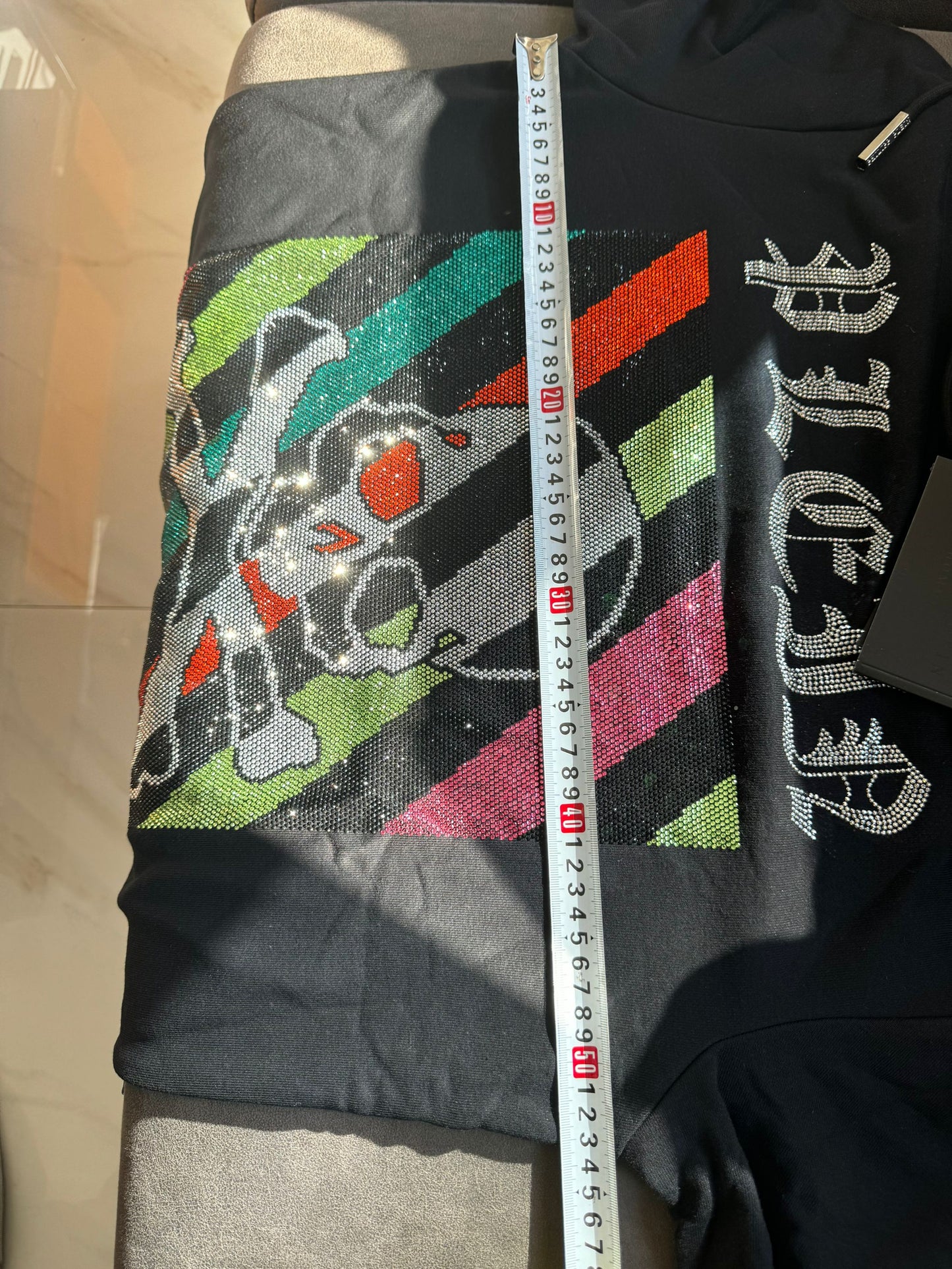 Philipp Plein black skull & crossbones hoodie with colorful stripes and rhinestones