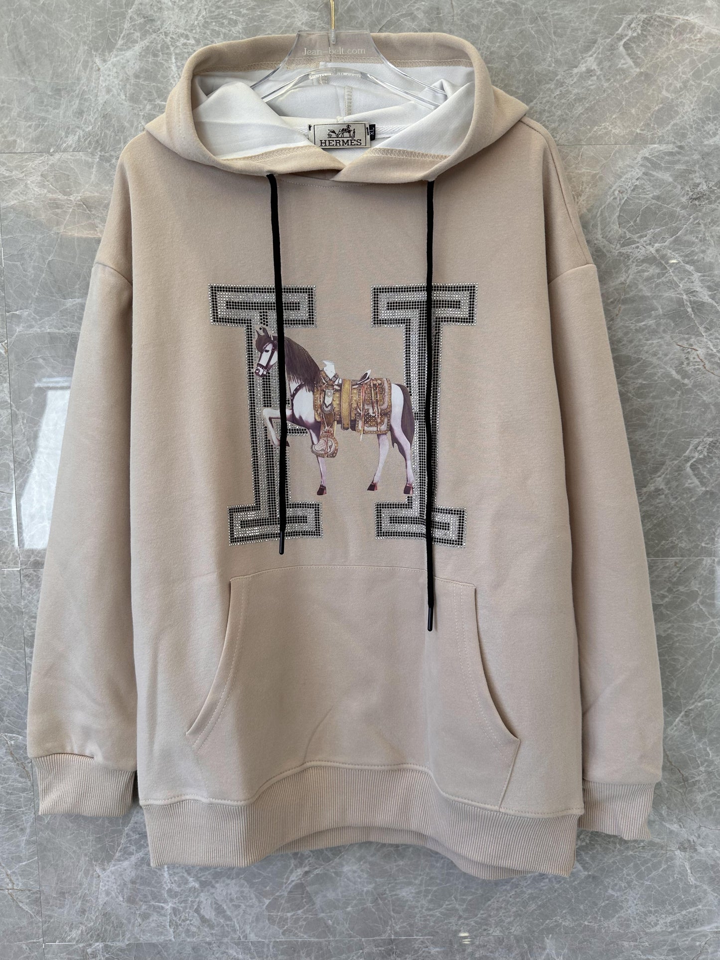 Moletom com capuz bege Hermès com cavalo bordado e monograma "H"