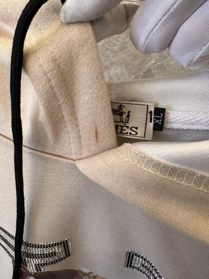 Moletom com capuz bege Hermès com cavalo bordado e monograma "H"
