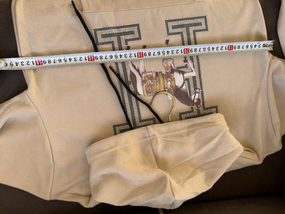 Moletom com capuz bege Hermès com cavalo bordado e monograma "H"