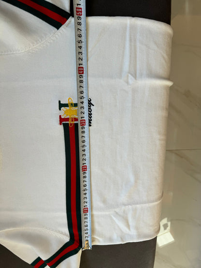 Blusa de malha de manga curta Gucci com logotipo bordado