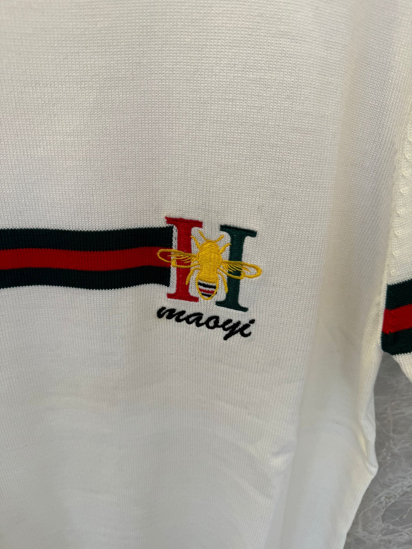 Blusa de malha de manga curta Gucci com logotipo bordado