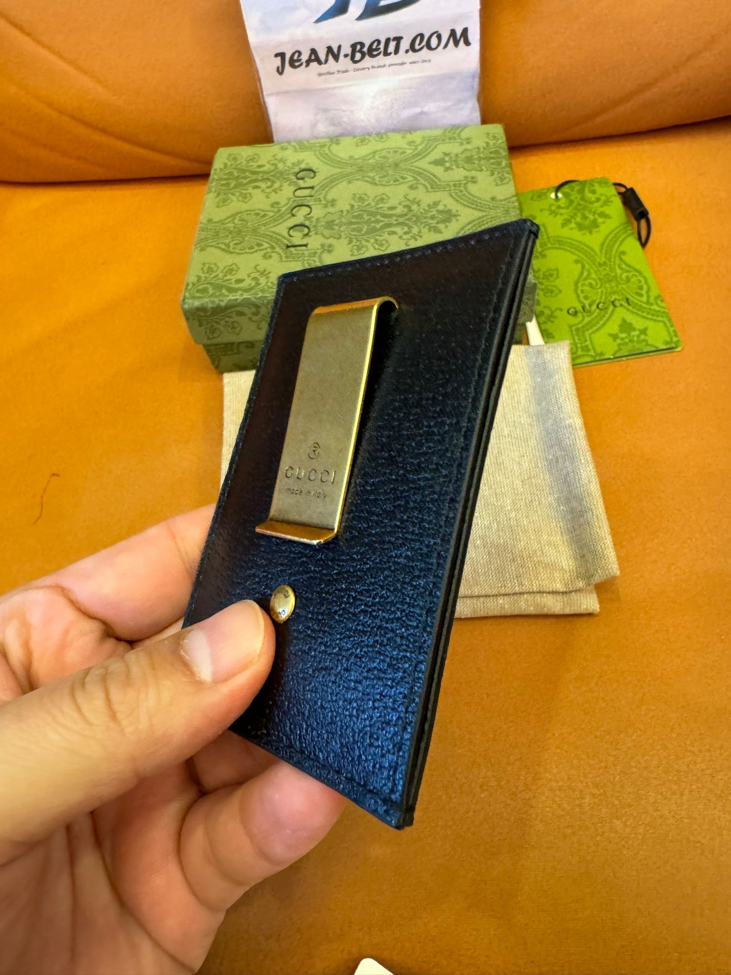 Gucci Porta-cartões com presilha para notas em couro GG