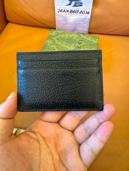 Tarjetero Gucci de piel negra con logotipo de abeja dorado