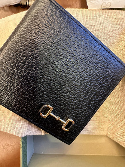 Carteira Hermès Bearn – couro togo preto com fecho prateado em forma de 'H'