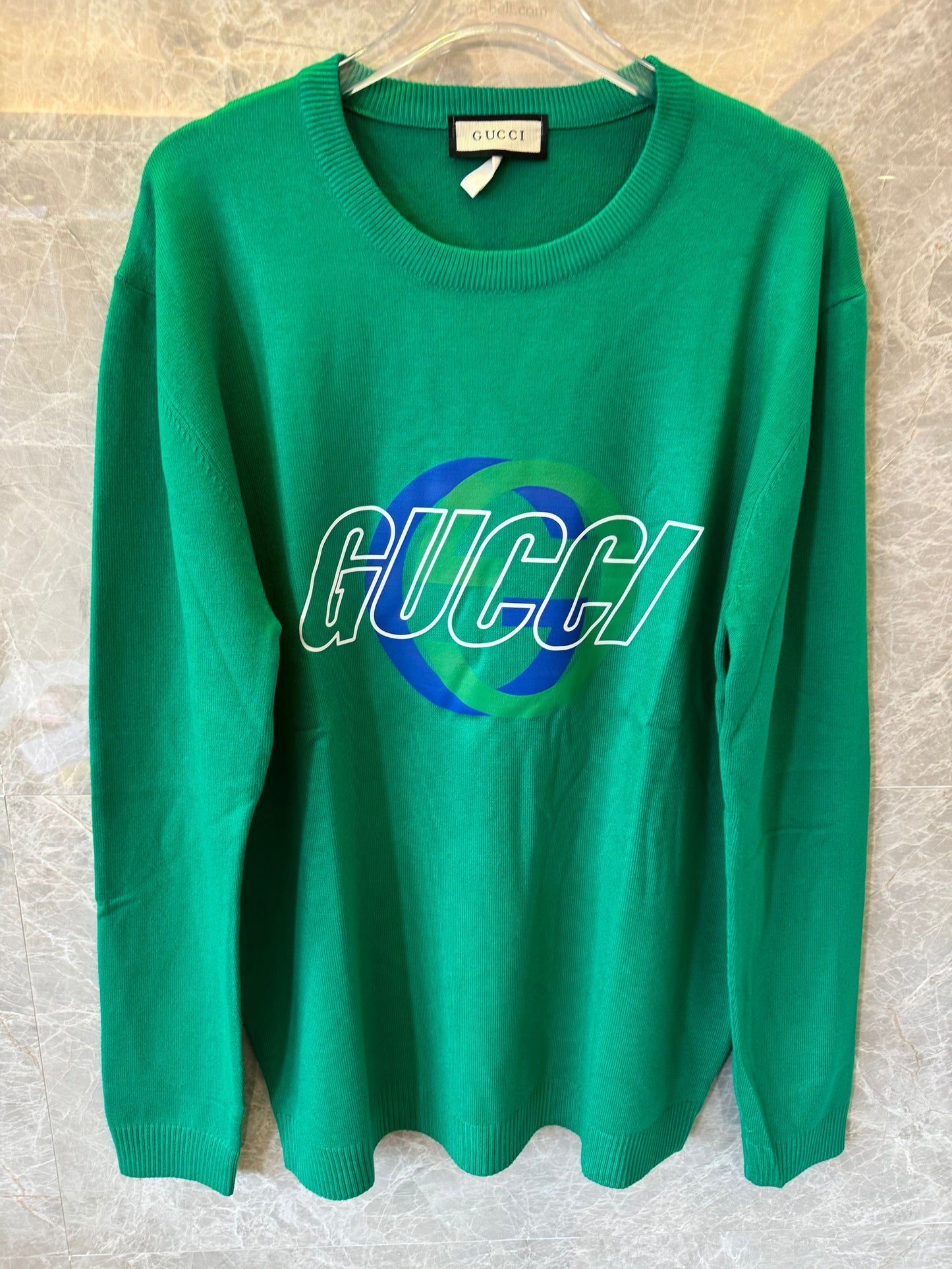 Suéter de malha com logotipo verde da Gucci