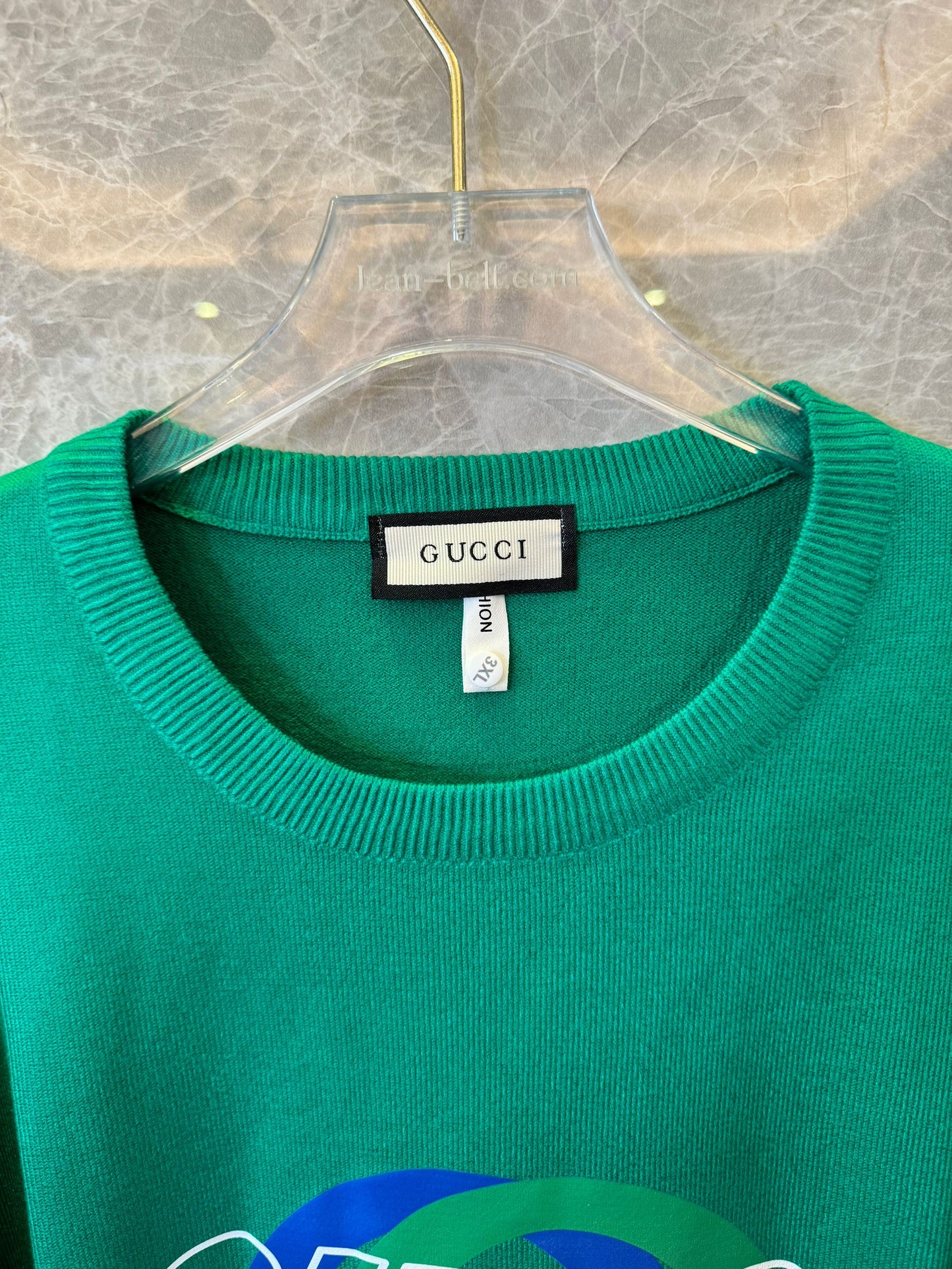 Suéter de malha com logotipo verde da Gucci