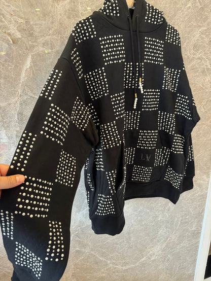 Sudadera con capucha a cuadros negra de Louis Vuitton con detalle de tachuelas