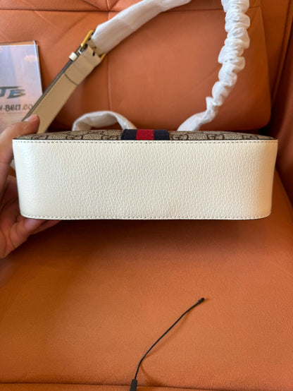 Sac photo Gucci gg supreme monogram en cuir de veau texturé petit ophidia beige ébène