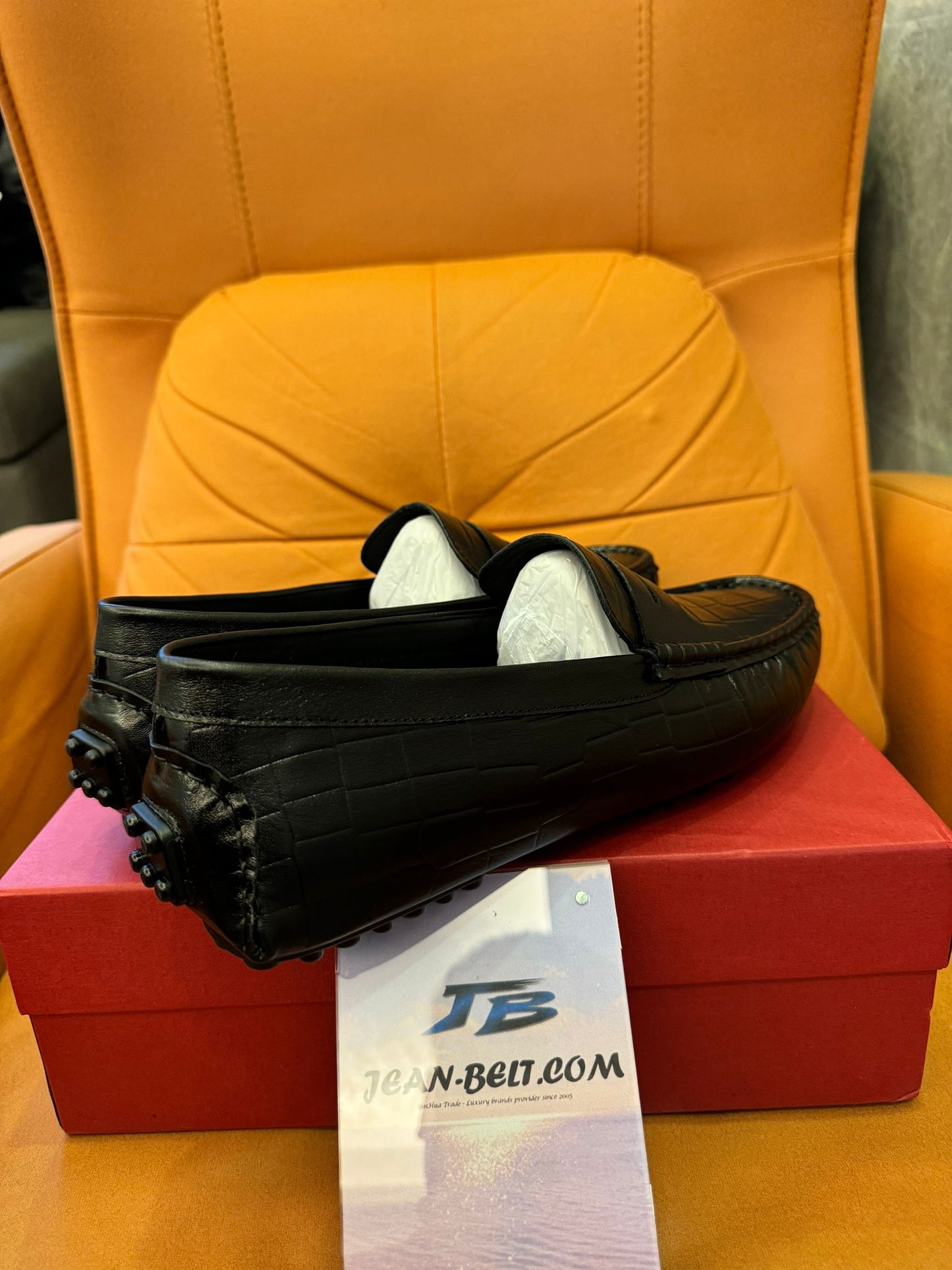 Salvatore Ferragamo men's black leather penny loafers with croc embossed design