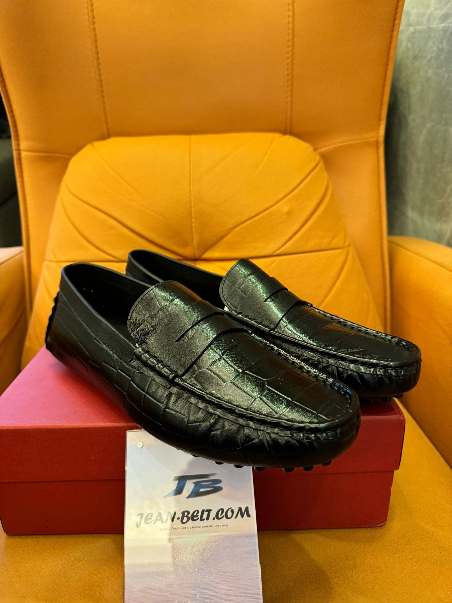 Salvatore Ferragamo men's black leather penny loafers with croc embossed design