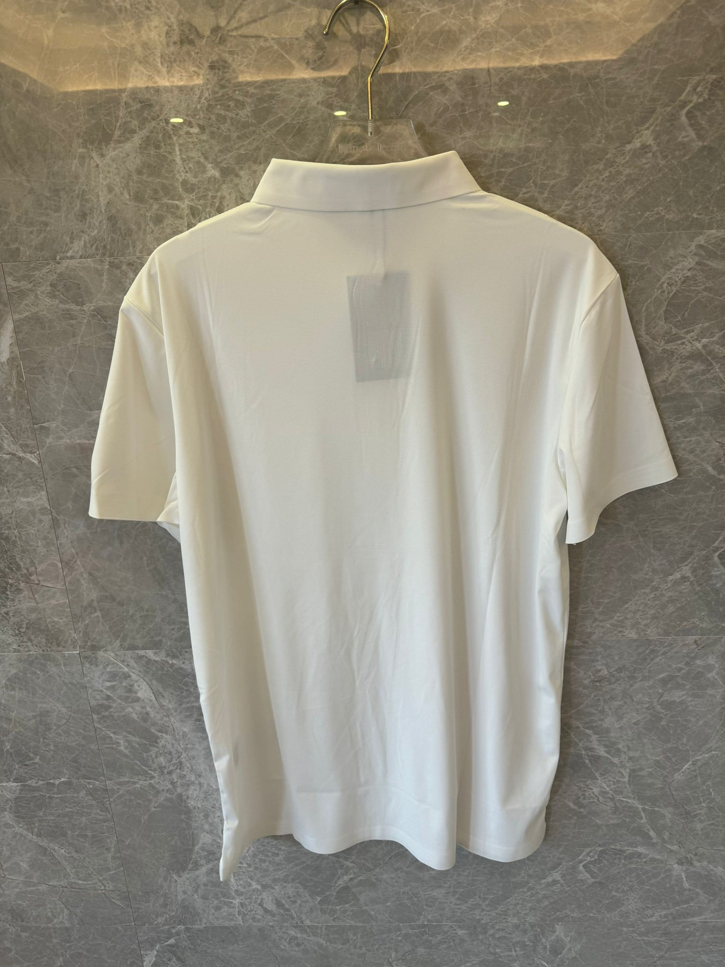 Polo blanco de Ferragamo