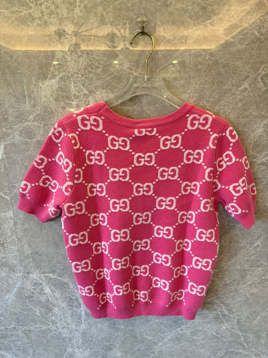 Blusa feminina de malha rosa com monograma GG da Gucci