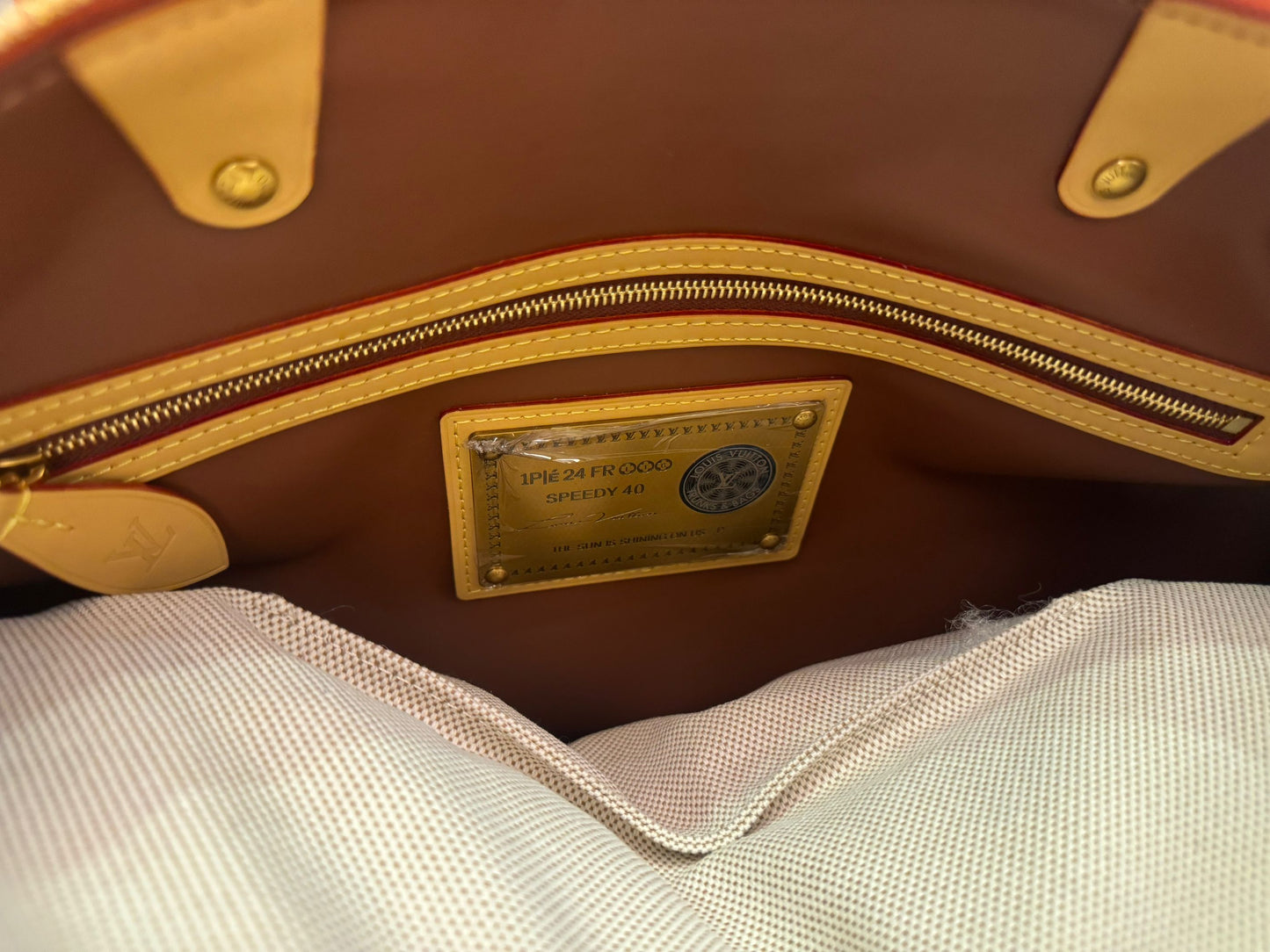 Bandoulière rápida de lona naranja con monograma de Louis Vuitton 30