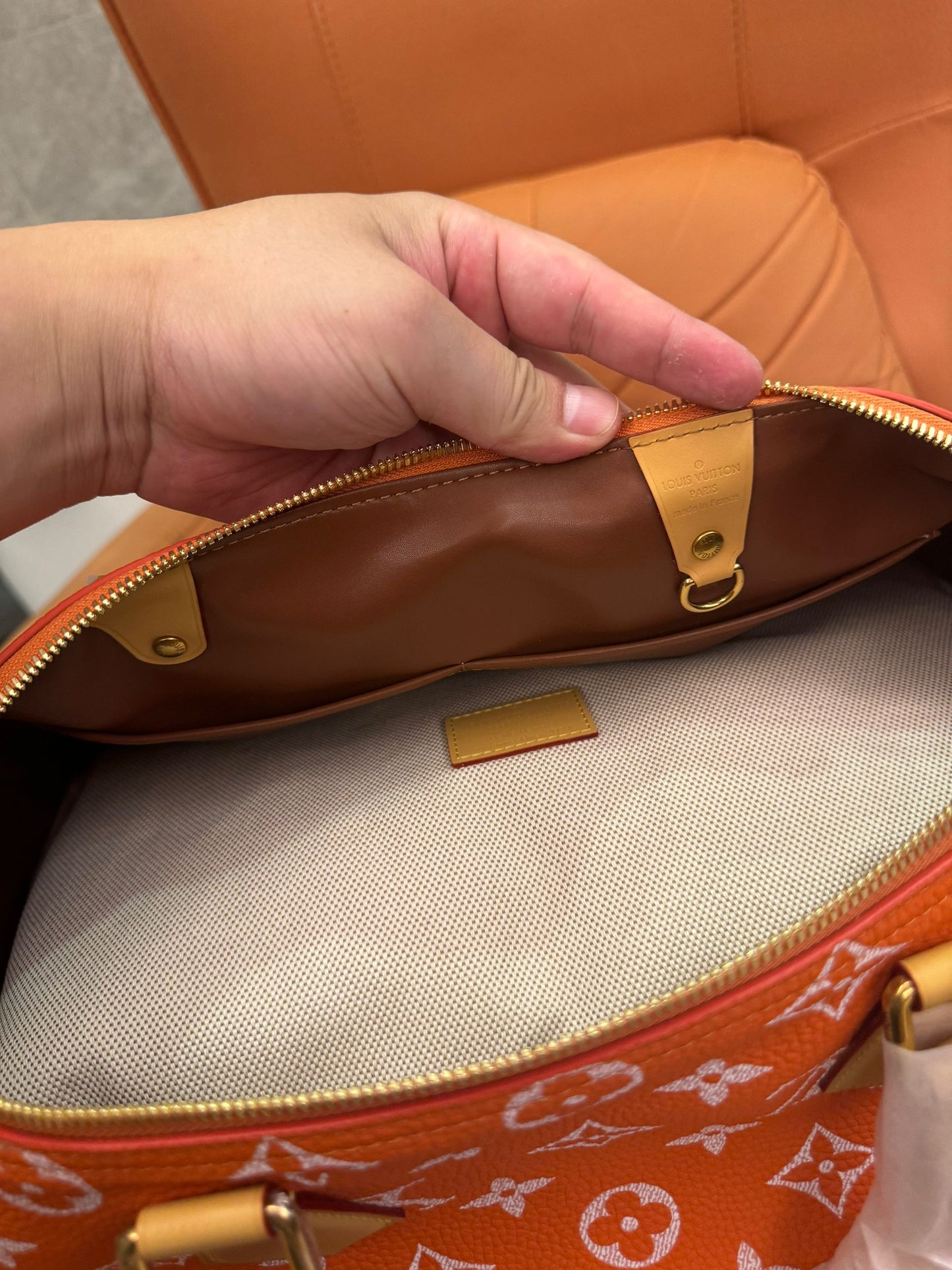 Bandoulière rápida de lona naranja con monograma de Louis Vuitton 30