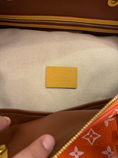 Bandoulière rápida de lona naranja con monograma de Louis Vuitton 30