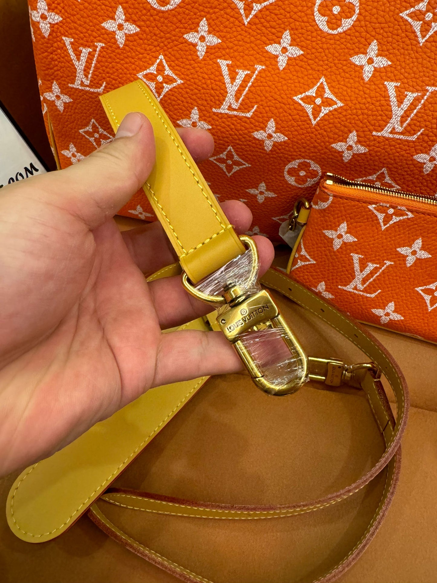 Bandoulière rápida de lona naranja con monograma de Louis Vuitton 30