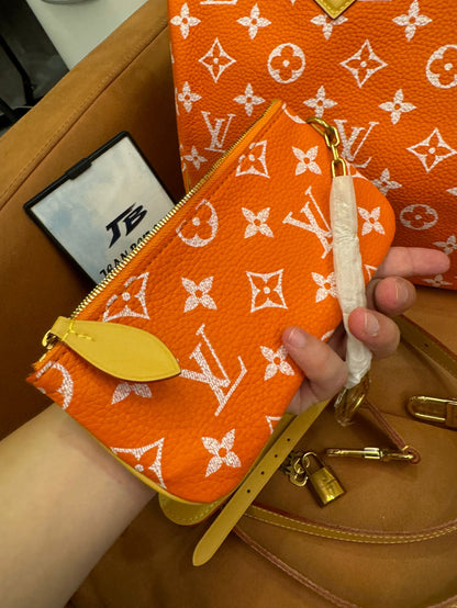 Bandoulière rápida de lona naranja con monograma de Louis Vuitton 30