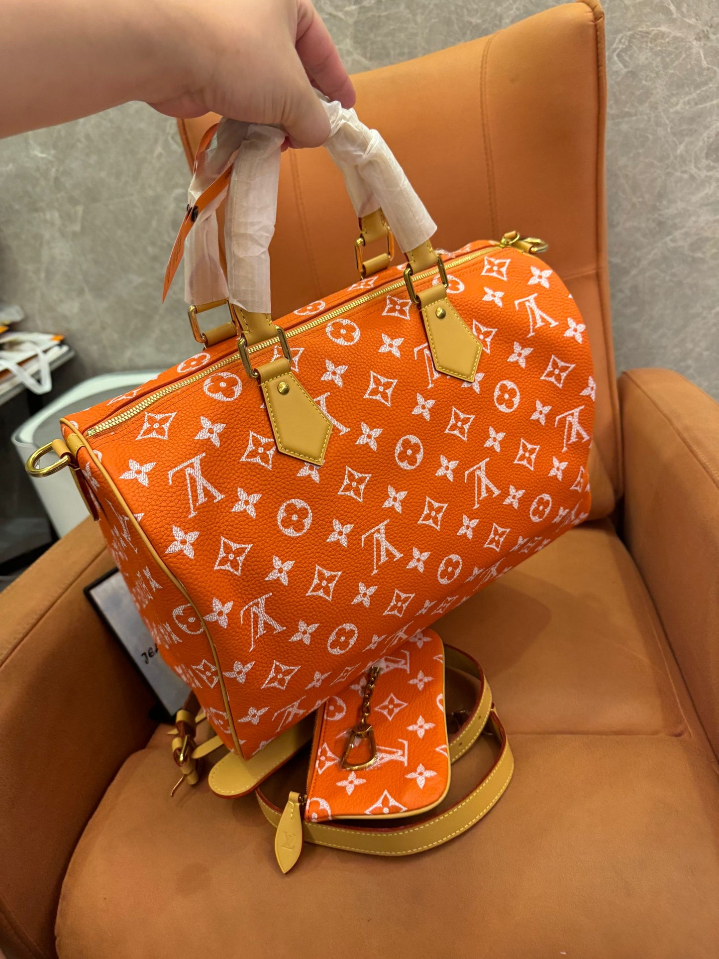Bandoulière rápida de lona naranja con monograma de Louis Vuitton 30