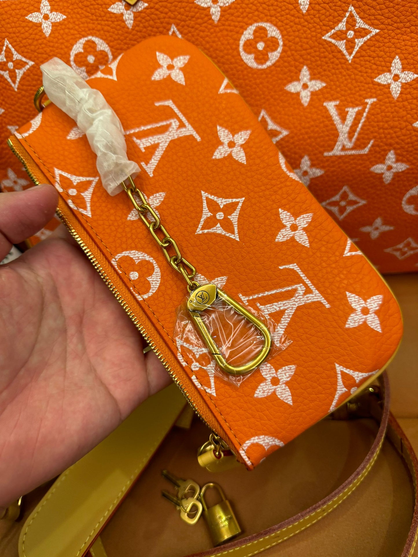 Bandoulière rápida de lona naranja con monograma de Louis Vuitton 30