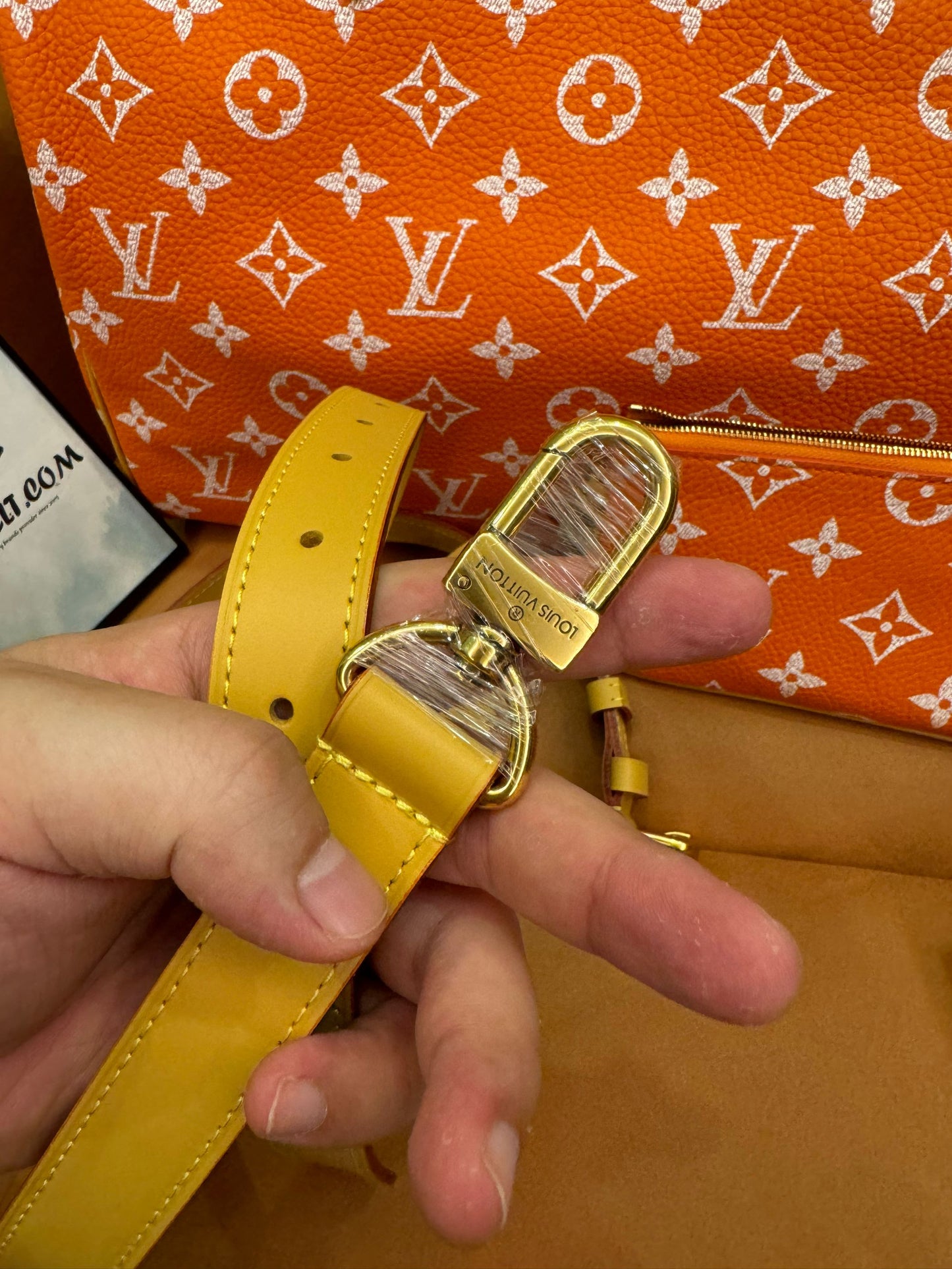 Bandoulière rápida de lona naranja con monograma de Louis Vuitton 30
