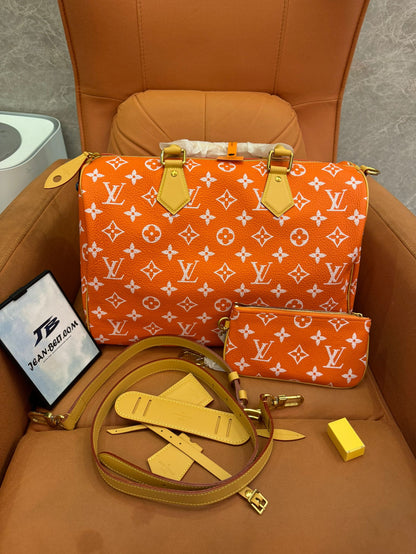 Bandoulière rápida de lona naranja con monograma de Louis Vuitton 30